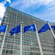 European flags in front of headquarters of European commission in Brussels in summer day