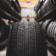 A new tire is placed on the tire storage rack in the car workshop. Be prepared for vehicles that need to change tires.