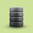 green wheel grass stack summer rubber transport car tyre summer tires ecology eco-friendly tires economical tires object pattern closeup automobile transportation vehicle black tire season safety auto background square speed protector new detail texture spring nature tread