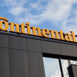continental, tire, company, automotive, business, signage, logo, continental tire company automotive business signage logo store brand tyre wheel yellow building emblem manufacturing automobile car industry international office sign symbol vehicle workshop car tires design display engineer shop poland technical tire production transport administration concept editorial logotype motor sky