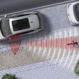 If another road user is approaching from behind as an occupant is exiting the vehicle, the exit warning system can issue warnings in various stages.