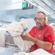 Wie mit einem textilen Putztuch-Service Entsorgungskosten gespart werden können